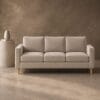 Ritz 3 Division Couch with three seat cushions, straight arms and tapered legs in a light neutral fabric