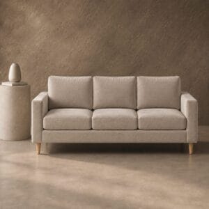 Ritz 3 Division Couch with three seat cushions, straight arms and tapered legs in a light neutral fabric