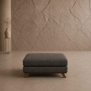 Monaco ottoman in dark grey fabric with wooden legs