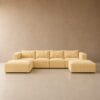 Pale Yellow corduroy custom modular couch with left corner, centre and right corner seats with Ottomans